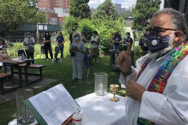 Caption: Fr. Juan says the first socially distant, in-person mass held since the start of the pandemic in the summer of 2020. 