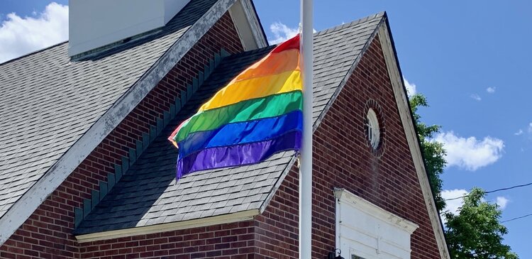 Pride Flag flying outside of St. Francis Church in Bellmore
